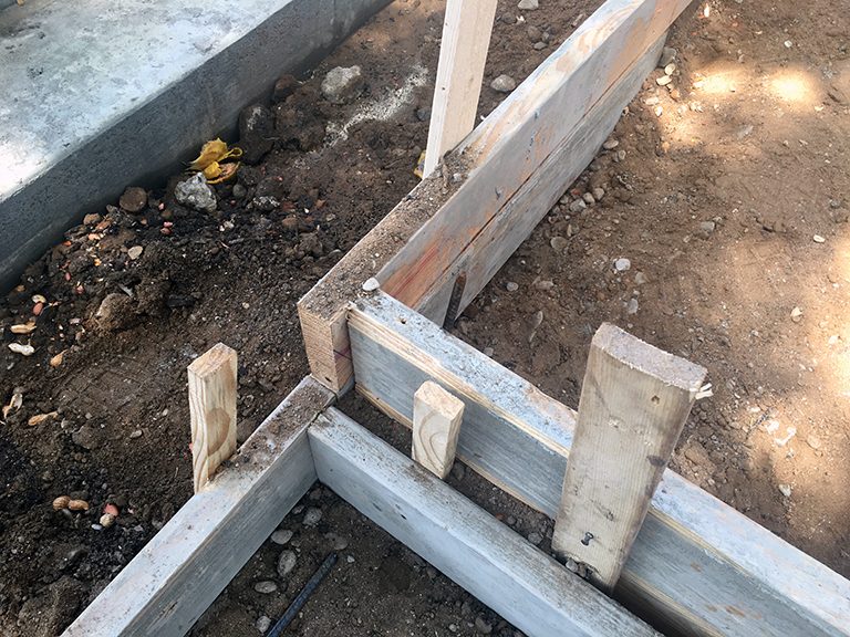 concrete formwork - floating sidewalk pads