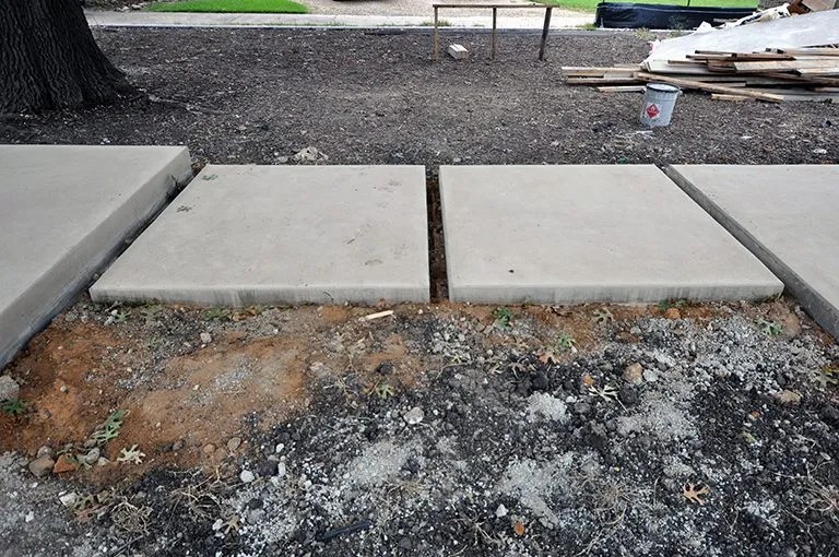 concrete sidewalk - floating pads