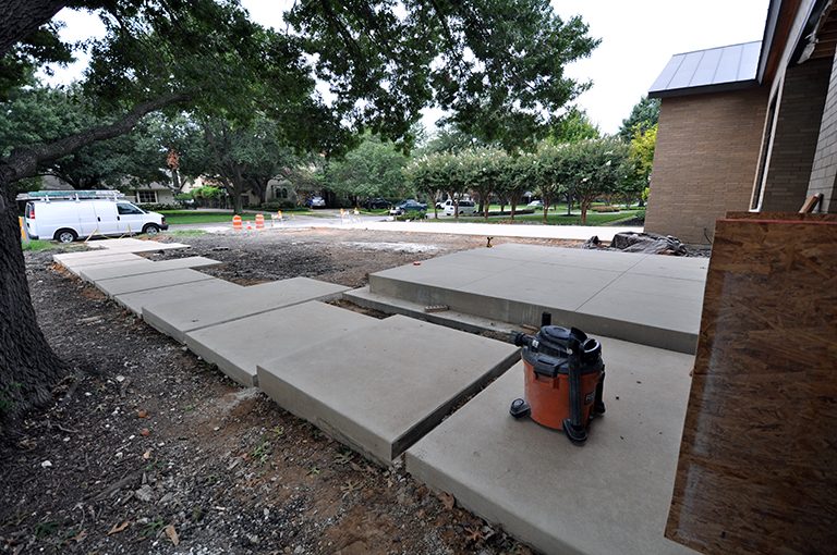 concrete sidewalk - floating pads