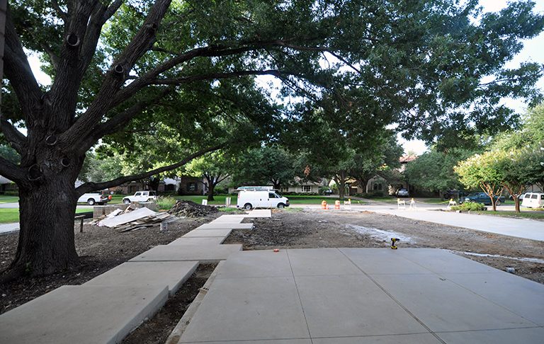 concrete sidewalk - floating pads