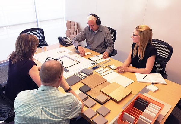 Deaf Architect meeting with clients [photo credit: Nick Thorn]