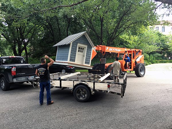 The Cottage House loading with a skytrack