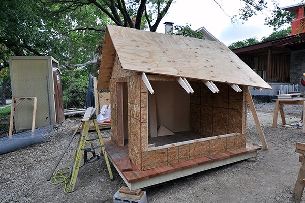 The Cottage House plywood sheathing with exposed rafter tails