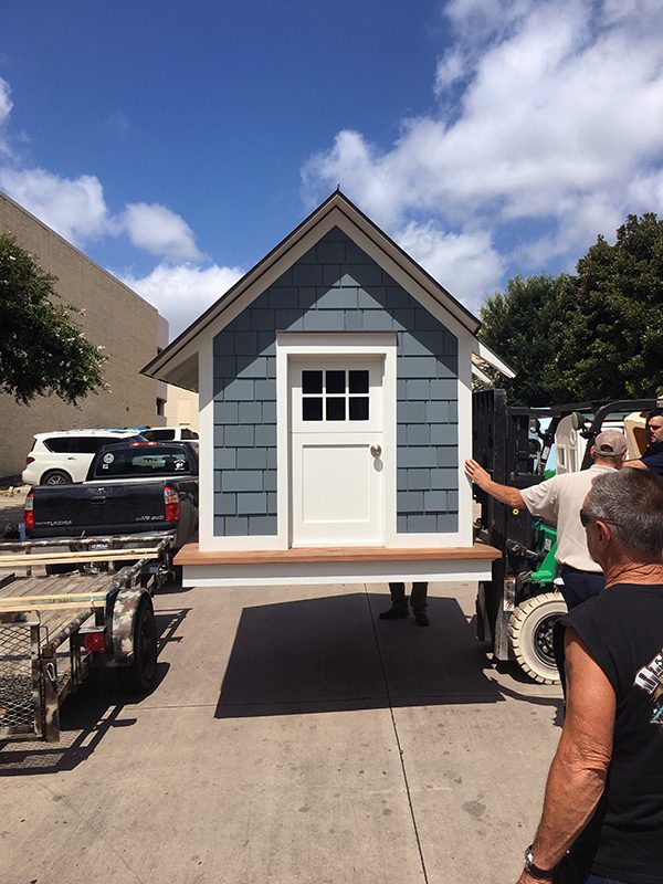 Unloading the Cottage House at the mall